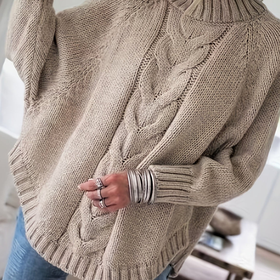 MAGLIONE A COSTINE CON ORLO A CAMPANA PER DONNE