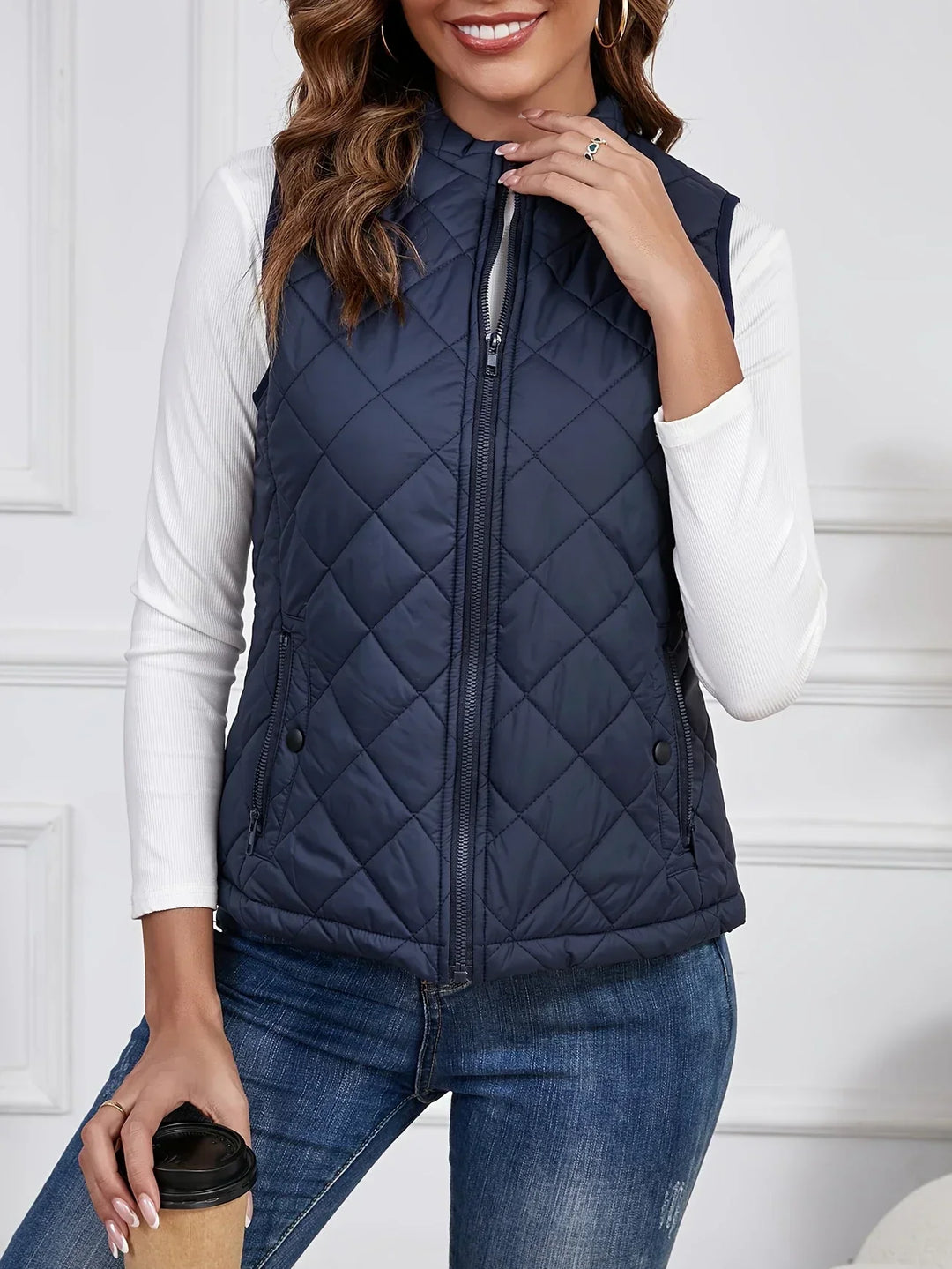 Gilet trapuntato senza maniche per donna con tasche con zip