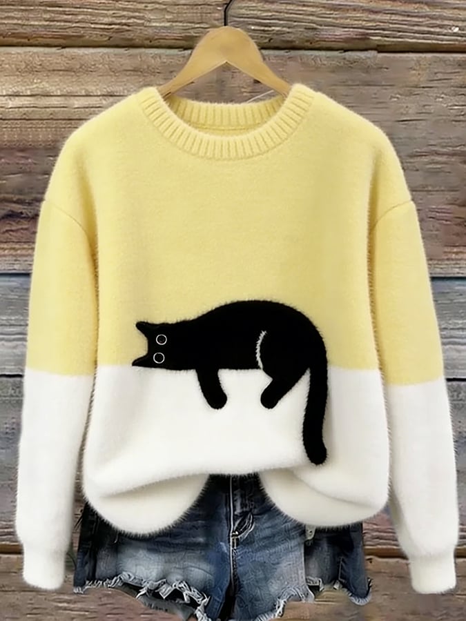 MAGLIONE LARGO A MOTIVO PER DONNE