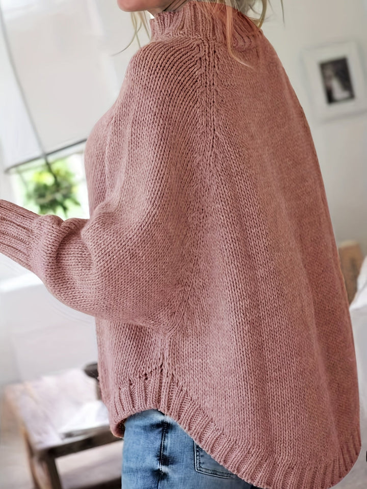 MAGLIONE A COSTINE CON ORLO A CAMPANA PER DONNE