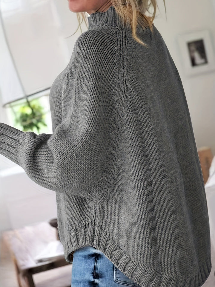 MAGLIONE A COSTINE CON ORLO A CAMPANA PER DONNE