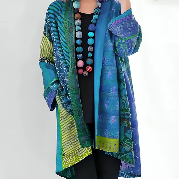 DAHLIENNE | CARDIGAN ELEGANTE IN MAGLIA CON TAGLIO STRATIFICATO