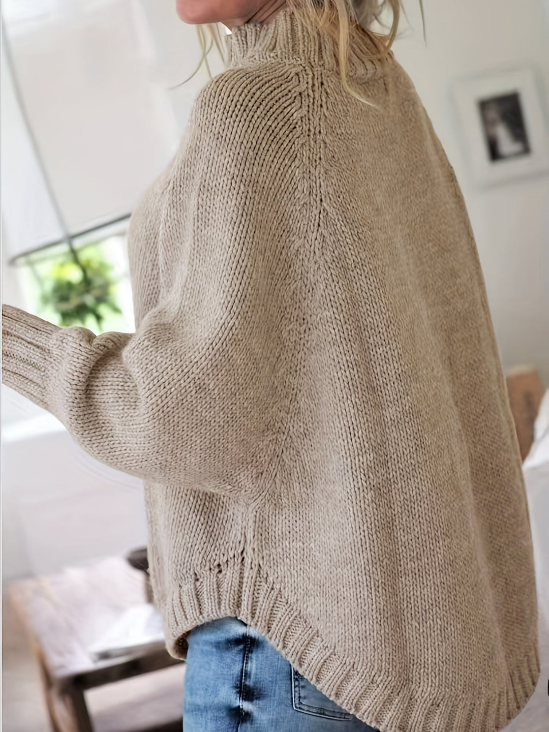 MAGLIONE A COSTINE CON ORLO A CAMPANA PER DONNE