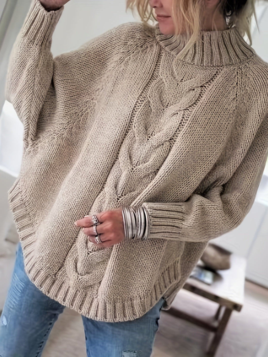 MAGLIONE A COSTINE CON ORLO A CAMPANA PER DONNE