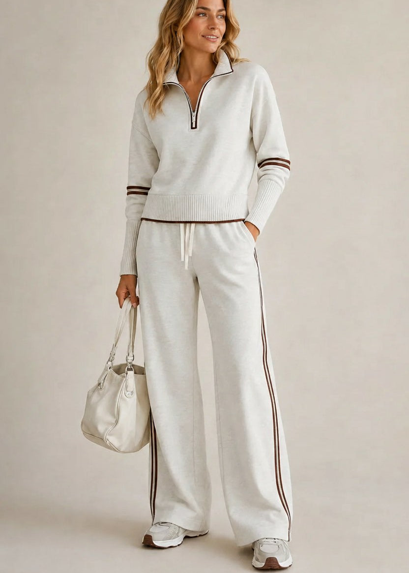 COMPLETO A RIGHE CON ZIP MEZZA PER DONNE