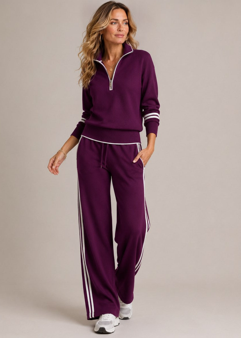 COMPLETO A RIGHE CON ZIP MEZZA PER DONNE