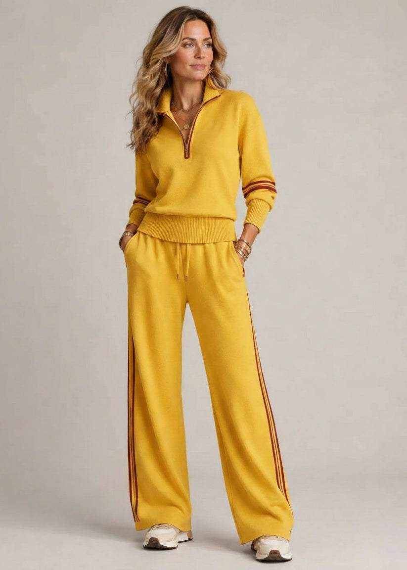 COMPLETO A RIGHE CON ZIP MEZZA PER DONNE